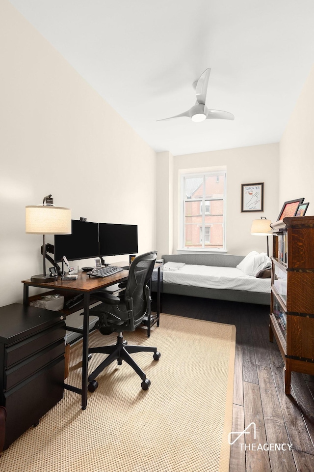 411 W 21st St Unit 3Flr, New York City, NY 10011 - bedroom featuring an office area, wood finished floors, and a ceiling fan
