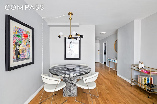 7 E 14th St Unit 429, New York City, NY 10003 - dining room featuring wood finished floors and baseboards