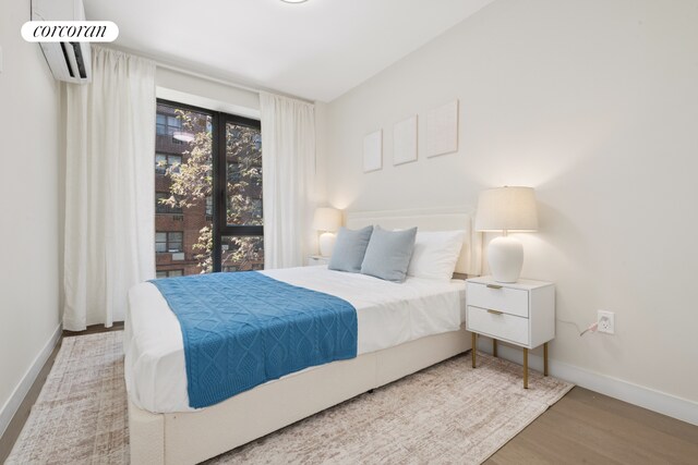 608 Ocean Ave Unit 403, New York City, NY 11226 - bedroom featuring wood finished floors and baseboards