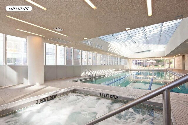 555 W 59th St Unit 18G, New York City, NY 10019 - indoor pool featuring a hot tub