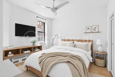 14 Prince St Unit 2-F, New York City, NY 10012 - bedroom featuring wood finished floors