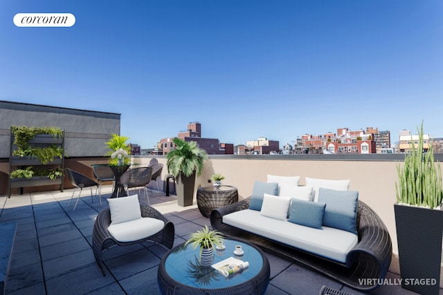 view of patio with a view of city and an outdoor living space