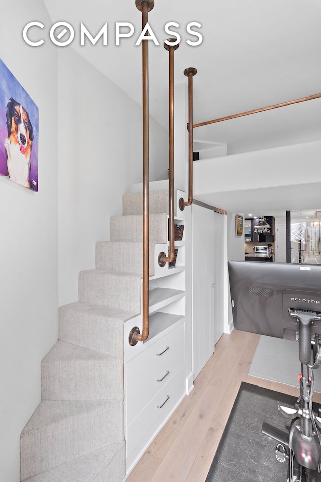 240 W 23rd St Phc, Phc, New York City, NY 10011 - staircase featuring wood finished floors