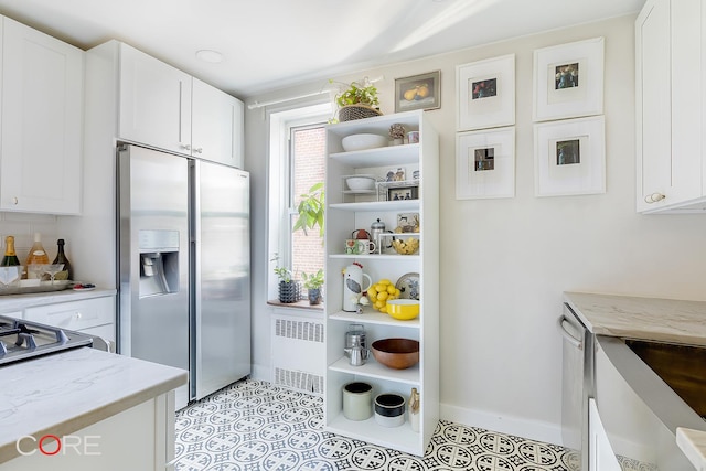 pantry featuring radiator heating unit
