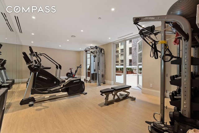 250 E 21st St Unit 10A, New York City, NY 10010 - exercise room with wood finished floors, baseboards, and recessed lighting