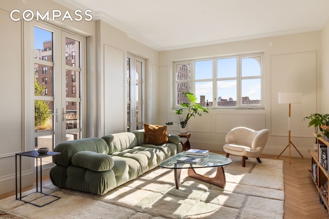 250 E 21st St Unit 10A, New York City, NY 10010 - living area featuring ornamental molding and french doors