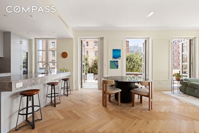 250 E 21st St Unit 10A, New York City, NY 10010 - dining area with crown molding
