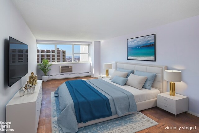 75 Henry St Unit 30K, New York City, NY 11201 - bedroom with a baseboard radiator, a wall mounted AC, and baseboards