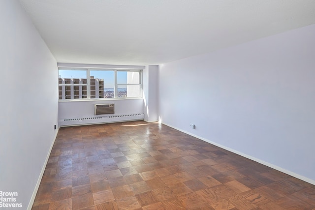 75 Henry St Unit 30K, New York City, NY 11201 - spare room with a baseboard heating unit, baseboards, and a wall mounted AC