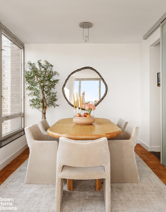 150 Columbus Ave Unit 18F, New York City, NY 10023 - dining area featuring plenty of natural light and baseboards