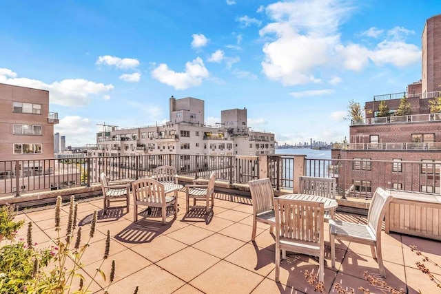 view of patio / terrace featuring a view of city