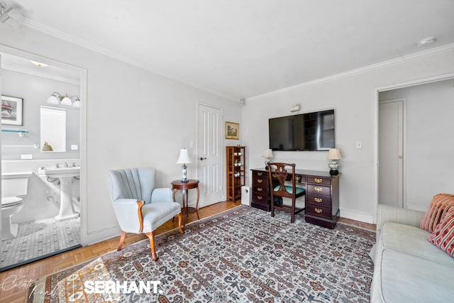 living room featuring crown molding and baseboards