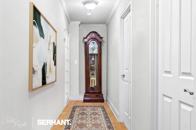 doorway to outside with ornamental molding and baseboards
