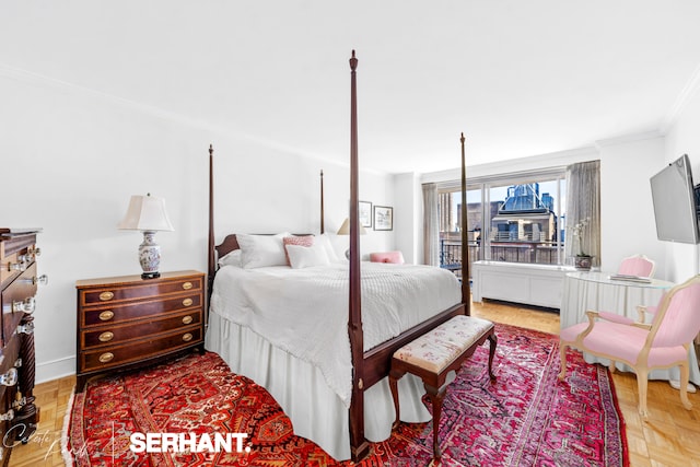 bedroom with crown molding