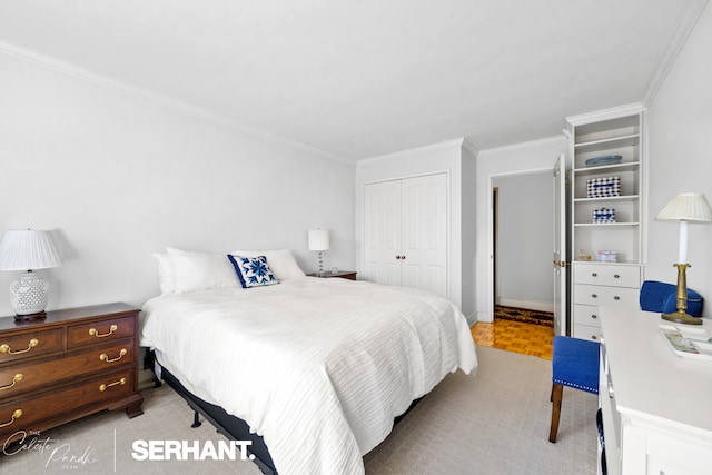 bedroom with a closet and crown molding
