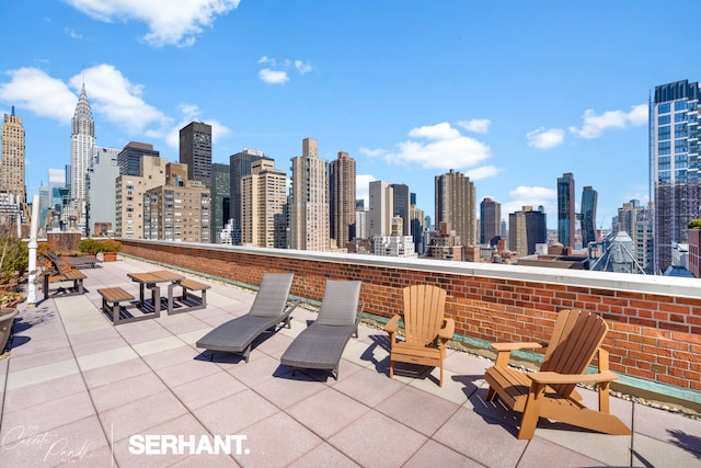 view of patio featuring a skyline view
