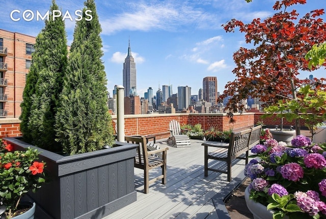 201 E 25th St Unit 7F, New York City, NY 10010 - deck featuring a skyline view