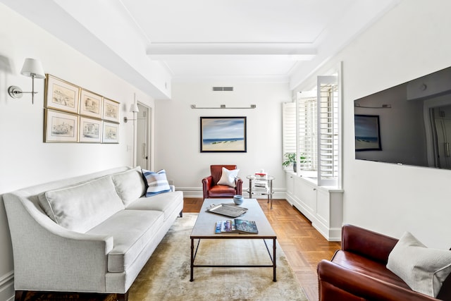 living area featuring beamed ceiling