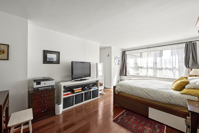 bedroom featuring wood finished floors