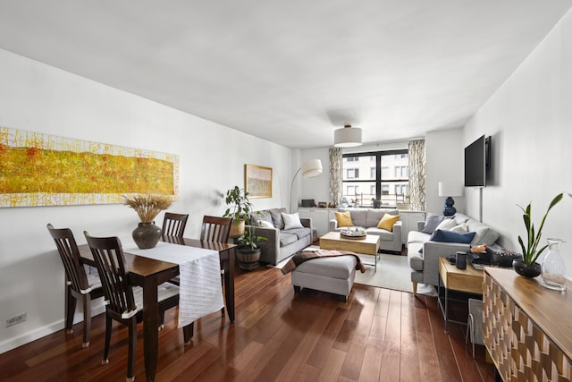 living room featuring dark wood-type flooring