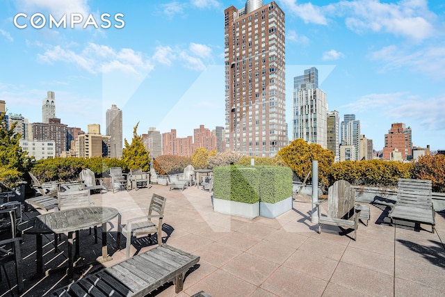 401 E 86th St Unit 15C, New York City, NY 10028 - view of patio / terrace featuring a view of skyline
