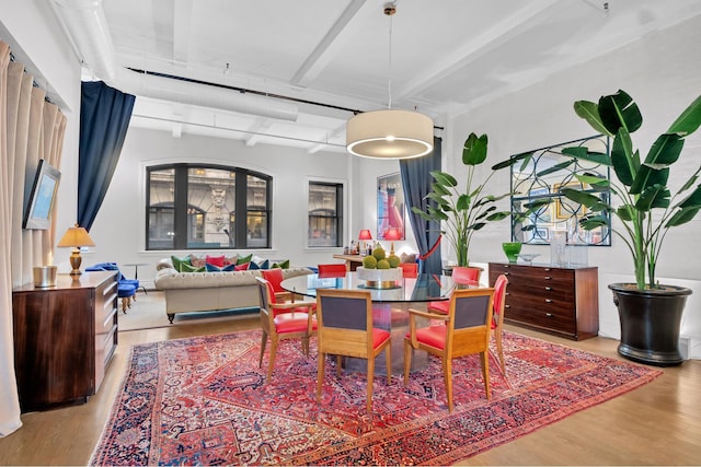 9 W 20th St Unit 2, New York City, NY 10011 - dining room with wood finished floors and beam ceiling