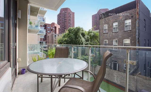 balcony featuring a view of city