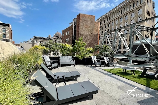 surrounding community with a patio