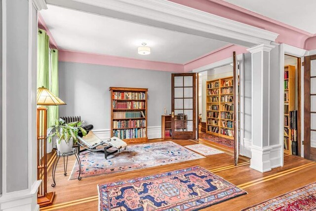 800 Riverside Dr Unit Duplex 1, New York City, NY 10032 - living room featuring decorative columns and wood finished floors