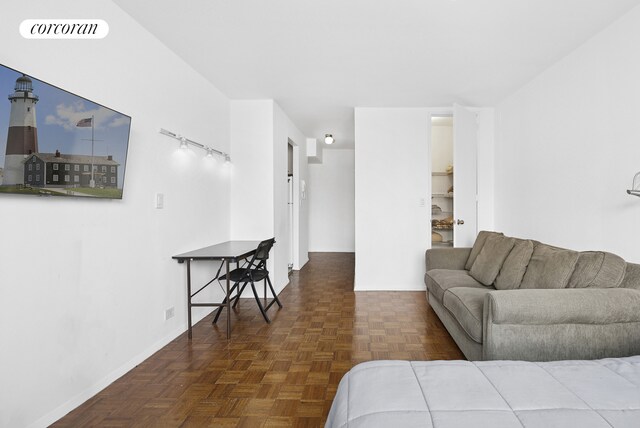 393 W 49th St Unit 3M, New York City, NY 10019 - living area with baseboards
