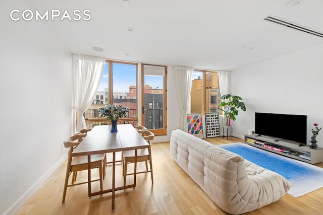 42 Rochester Ave Unit 3, New York City, NY 11233 - living room featuring light wood-style flooring and baseboards