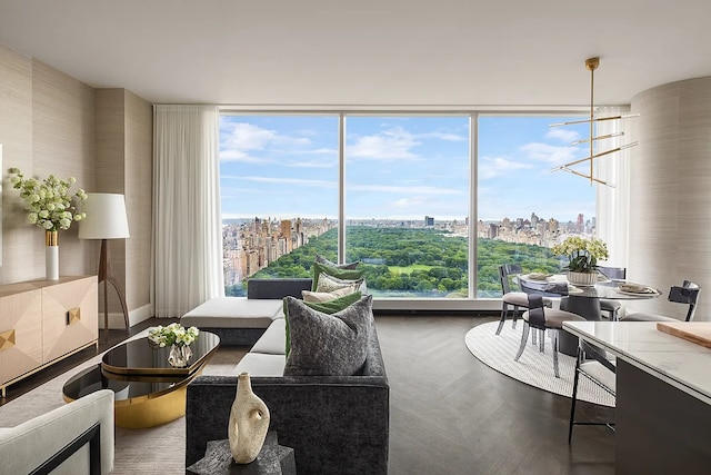 living area with a healthy amount of sunlight and a view of city