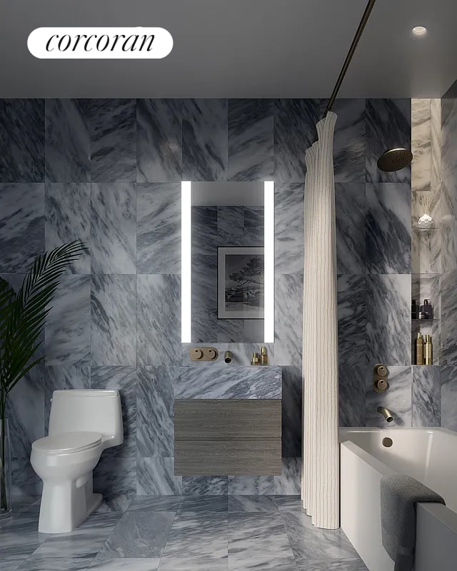 130 William St Unit 64B, New York City, NY 10038 - bathroom featuring a shower with shower curtain, tile walls, vanity, and a tub
