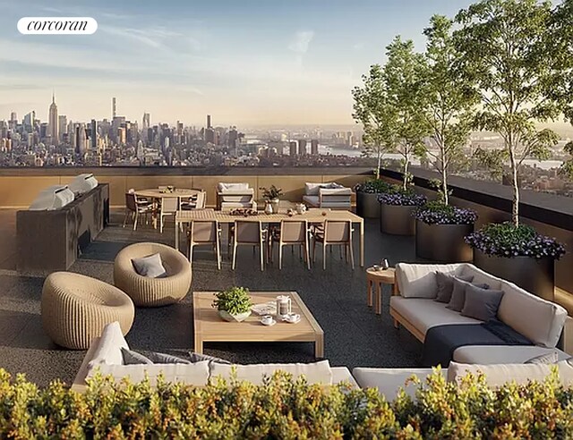 130 William St Unit 43C, New York City, NY 10038 - patio terrace at dusk featuring outdoor lounge area, a skyline view, and area for grilling
