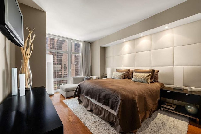 1600 Broadway Unit 18C, New York City, NY 10019 - bedroom featuring light wood-style floors