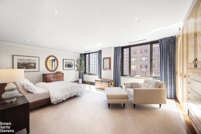 345 E 57th St Unit 8Ab, New York City, NY 10022 - bedroom featuring light carpet and recessed lighting