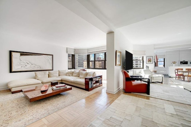 20 Sutton Pl S Unit 16/17Ef, New York City, NY 10022 - living room featuring baseboards