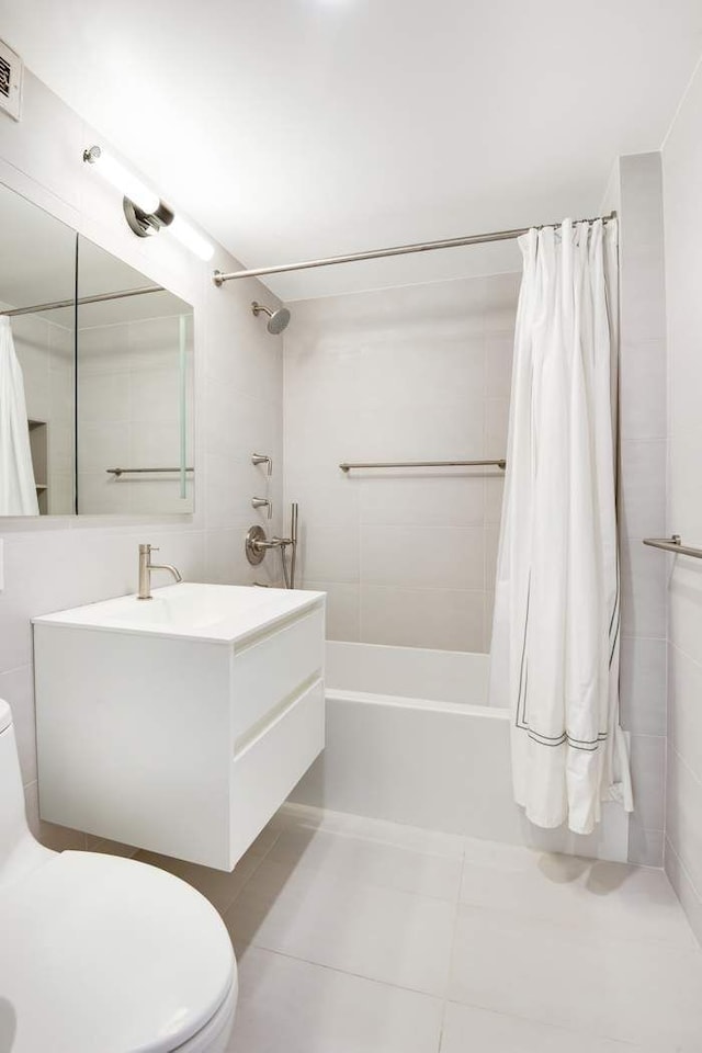 20 Sutton Pl S Unit 16/17Ef, New York City, NY 10022 - bathroom with tile patterned flooring, shower / tub combo with curtain, visible vents, vanity, and toilet