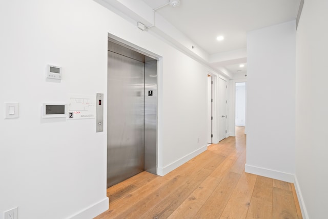 245 E 53rd St Unit 2, New York City, NY 10022 - corridor with elevator, light wood-style floors, recessed lighting, and baseboards