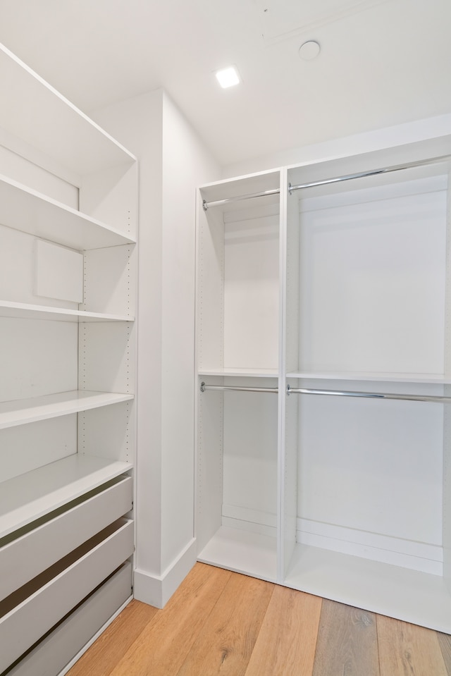 245 E 53rd St Unit 2, New York City, NY 10022 - walk in closet with wood finished floors