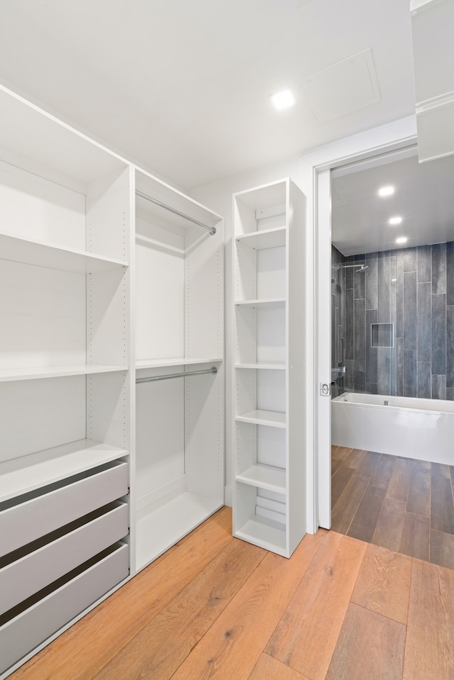 245 E 53rd St Unit 2, New York City, NY 10022 - walk in closet with wood finished floors