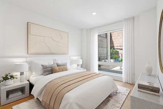 245 E 53rd St Unit 2, New York City, NY 10022 - bedroom with light wood-type flooring