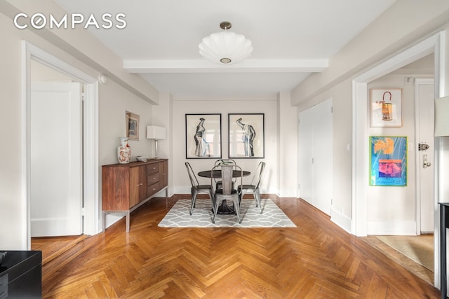 400 E 59th St Unit 3G, New York City, NY 10022 - dining area featuring beamed ceiling and baseboards
