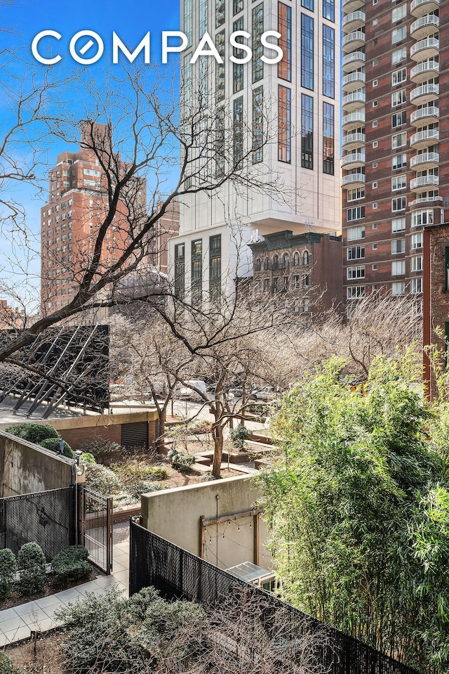 400 E 59th St Unit 3G, New York City, NY 10022 - view of property exterior with fence