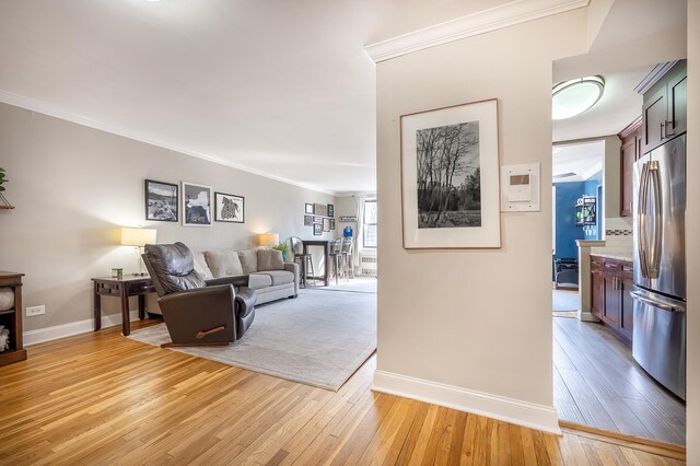 6495 Broadway Unit 6-T, New York City, NY 10471 - living room with light wood-style flooring and ornamental molding