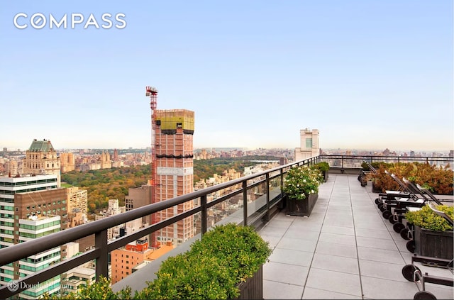 balcony featuring a view of city