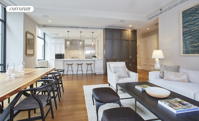 living area with wood finished floors