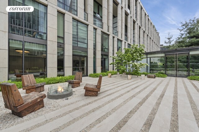 101 Warren St Unit 1720, New York City, NY 10007 - view of patio with a fire pit