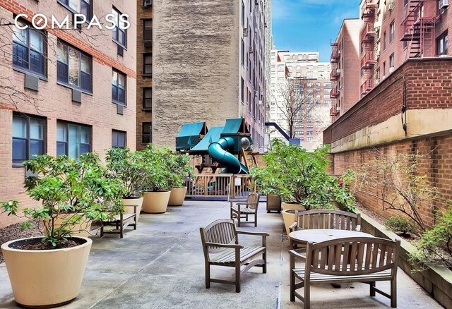 340 E 80th St Unit 1D, New York City, NY 10075 - view of patio with a city view