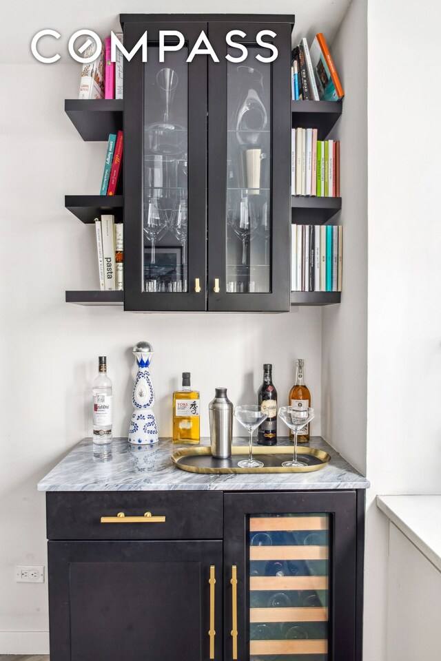340 E 80th St Unit 1D, New York City, NY 10075 - indoor dry bar featuring wine cooler